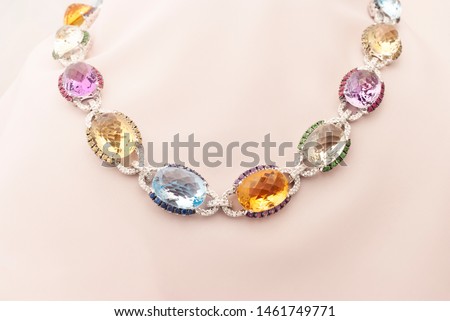 White Gold Necklace With Blue And Yellow Sapphire, Rubies, Amethyst, Green Garnet And Diamonds
