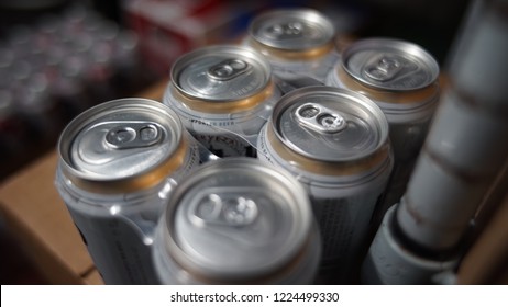 White And Gold Six Pack Of Beer Cans In Keg Room