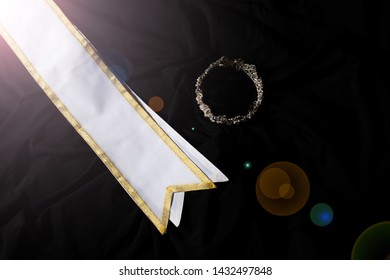 White Gold Winner Sash For Miss Pageant Beauty Contest, Empty Area For Text Winner Country Word, Studio Lighting Abstract Dark Drapping Textile Background, Importance Decoration With Diamond Crown