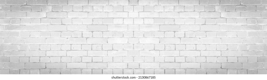 White gray light damaged rustic brick wall brickwork stonework masonry texture background banner panorama pattern template architecture	