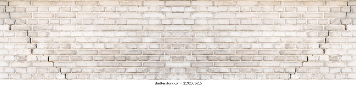 White gray light damaged rustic brick wall brickwork stonework masonry texture background banner panorama pattern template architecture, with cracks