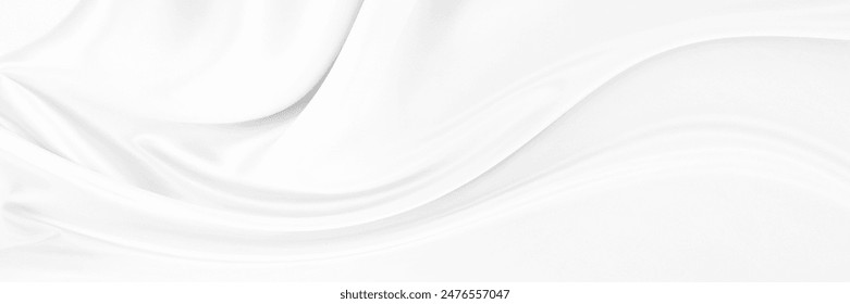 White gray satin texture that is white silver fabric silk panorama background with beautiful soft blur pattern natural.