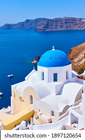 White greek church on picturesque coast of Santorini island, Oia, Greece. Greek landscape