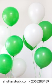 White And Green Balloons On A White Background