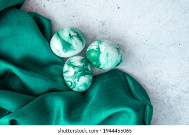 White And Green Handprinted Easter Eggs Folded In Green Silky Scarf