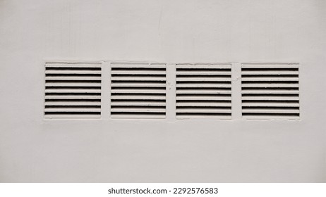 white grid on white wall as background