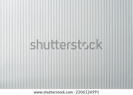 white grooving wall background. Abstract white striped geometric wallpaper