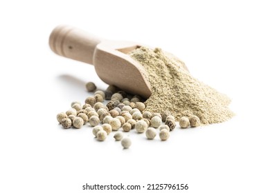 White ground pepper and whole peppercorn spice in wooden scoop isolated on white background. - Shutterstock ID 2125796156