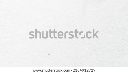 White grunge background. Paper noise texture. Black dust grain sand particles on old rough uneven surface abstract copy space overlay.