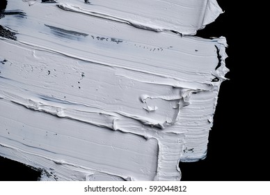 White Grunge Brush Strokes Paint On Black Background