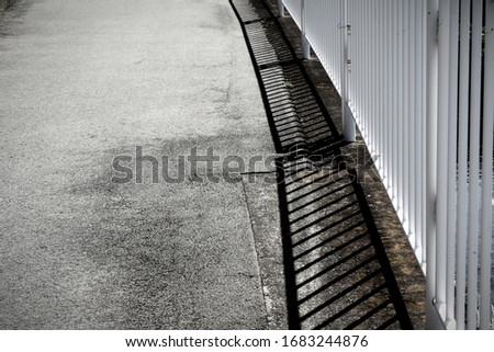 Similar – on patrol Stripe Barrier