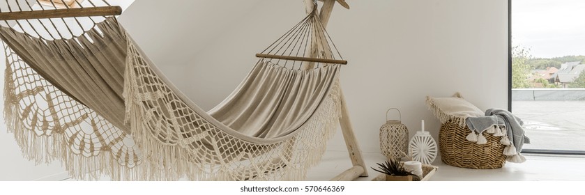 White hammock with lace in the modern designed room