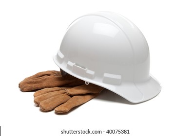 A White Hard Hat And Leather Work Gloves On A White Background
