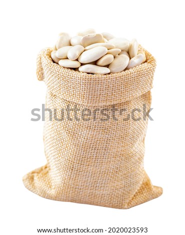 White Haricot bean grains are in the sack. White Haricot bean grains isolated on white background.