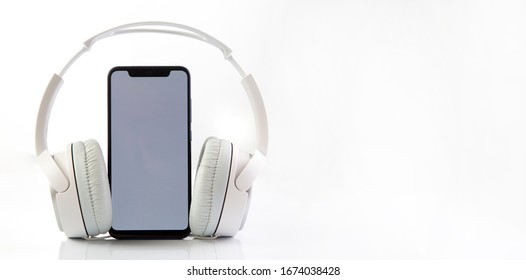 White Headphones On Smartphone Music Online Concept, Mockup, Isolate On White