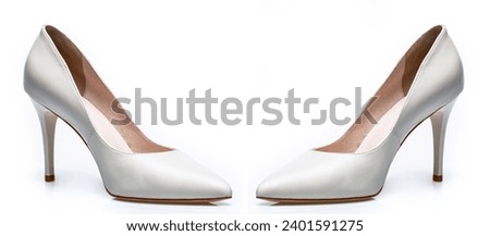 White high heel women shoes on white background. White shoe for women. Beauty and fashion concept. Fashionable women shoes isolated on white background. Stylish classic women leather shoe.