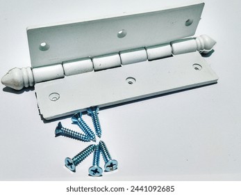 a white hinge made of quality plastic and nuts that can be attached to furniture such as doors, cupboards