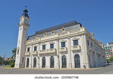 white historic building with clock tower