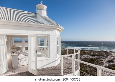White home showcase bedroom overlooking ocean