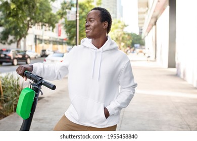 White Hoodie On A Man With Scooter