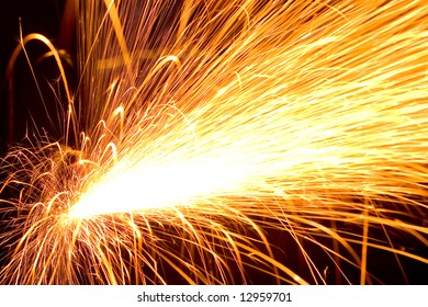White hot sparks  at grinding steel material