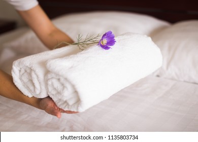 White Hotel Bed Sheets And Towel Set. Maid Cleaning Bed. Room Service.