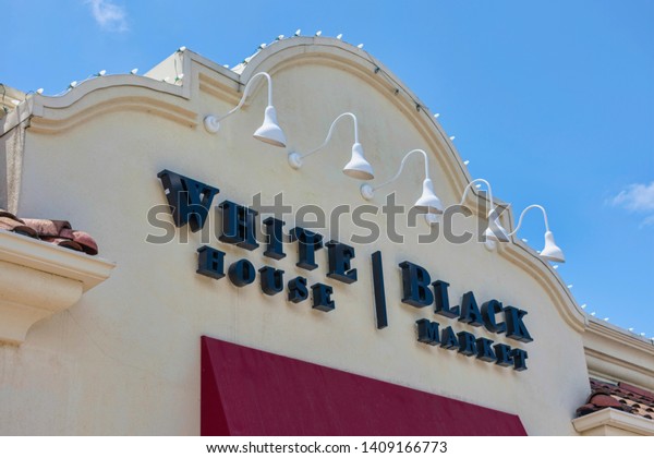 White House Black Market trademark logo on retail\
store. White House Black Market is American women\'s clothing\
retailer headquartered in Fort Myers, Florida - Los Gatos,\
California, USA - May 27,\
2019