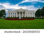 White House in Washington DC. The White House under blue sky. American presidents residence. Iconic White House building. Federal government. The White House and American flag.