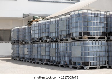 white IBC containers on, Chemical storage containers in factory.