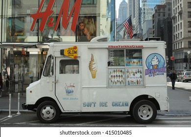 White Ice Cream Truck In Front Of The H&M Store, Side View - April 30, 2016, 48th Street, New York City, NY, USA