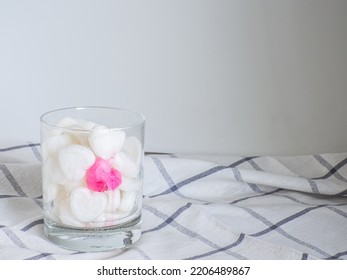 White Ice cubes made from milk in heart shape with one red heart in glass. Space for text. Valentines day breakfast eating, love concept. - Shutterstock ID 2206489867