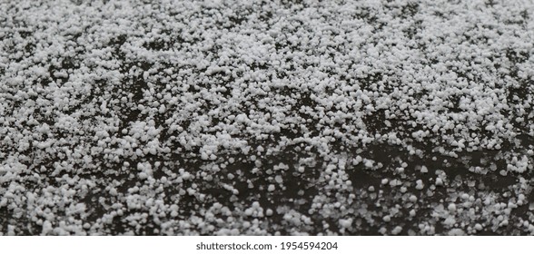 White Ice Floes Of Hail Lying On A Stone Windowsill