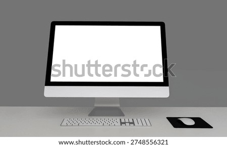 White iMac desktop computer with an empty screen, accompanied by a keyboard and mouse, placed on a pristine desk