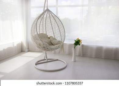 White Interior. White Hanging Chair. Cocoon Chair