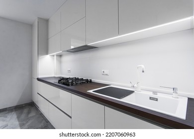 White Interior Kitchen With Built-in Furniture