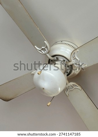 White Interior Kitchen Ceiling Fan Light Fixture in Residential Home Setting