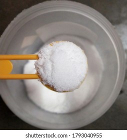 White And Iodised Salt With Spoon 