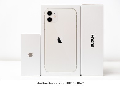 White iphone 11 and airpods boxes isolated on the white background, December 2020, San Francisco, USA