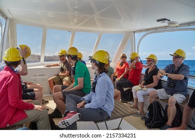 White Island, New Zealand - Circa 2016: Volcanic Tour, Group On The Boat Ride Prepared With Gas Masks Against Sulfuric Fumes. Tours Landing On The Island Stopped After The Fatal Eruption In 2019