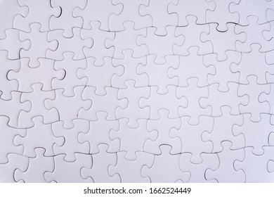 White jigsaw pattern with educational concept. - Shutterstock ID 1662524449