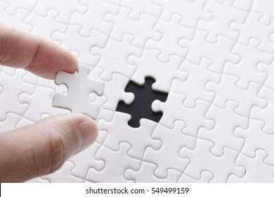 White jigsaw puzzle - Shutterstock ID 549499159