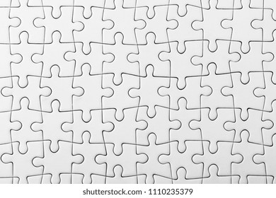 White jigsaw puzzle pattern as a background