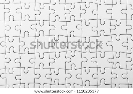 White jigsaw puzzle pattern as a background