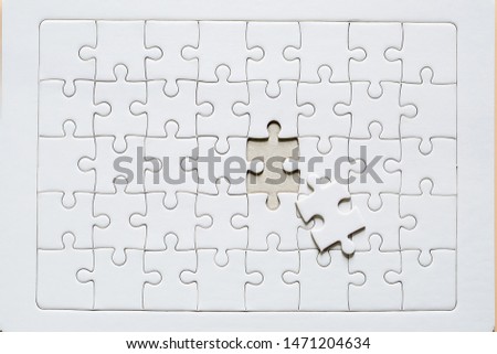 White jigsaw puzzleSet puzzle pieces. Texture mosaic background.