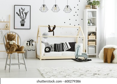 White Kid Bedroom With House Bed, Lamps, Chair And Poster