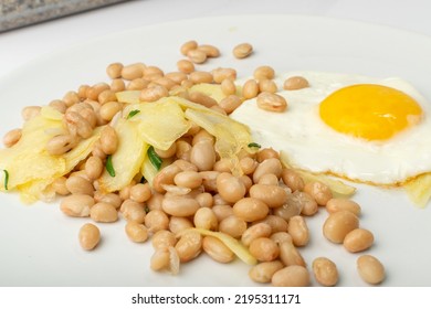 White Kidney Beans With Egg And Potato. Cooked Cannellini Bean Pile, Baked Legume, Yellow Beans Breakfast On White Plate