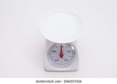 White kitchen scales isolated on white background 