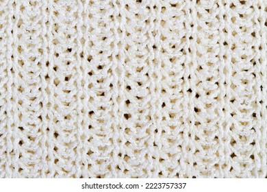 White Knitted Fabric Background Or Texture