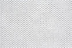 White Knitted Texture And Background.