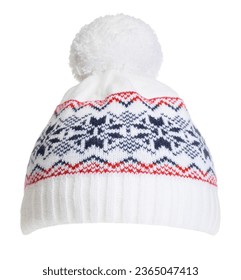 White knitted winter hat decorated with Scandinavian geometric ornament with pompom on top isolated on white background